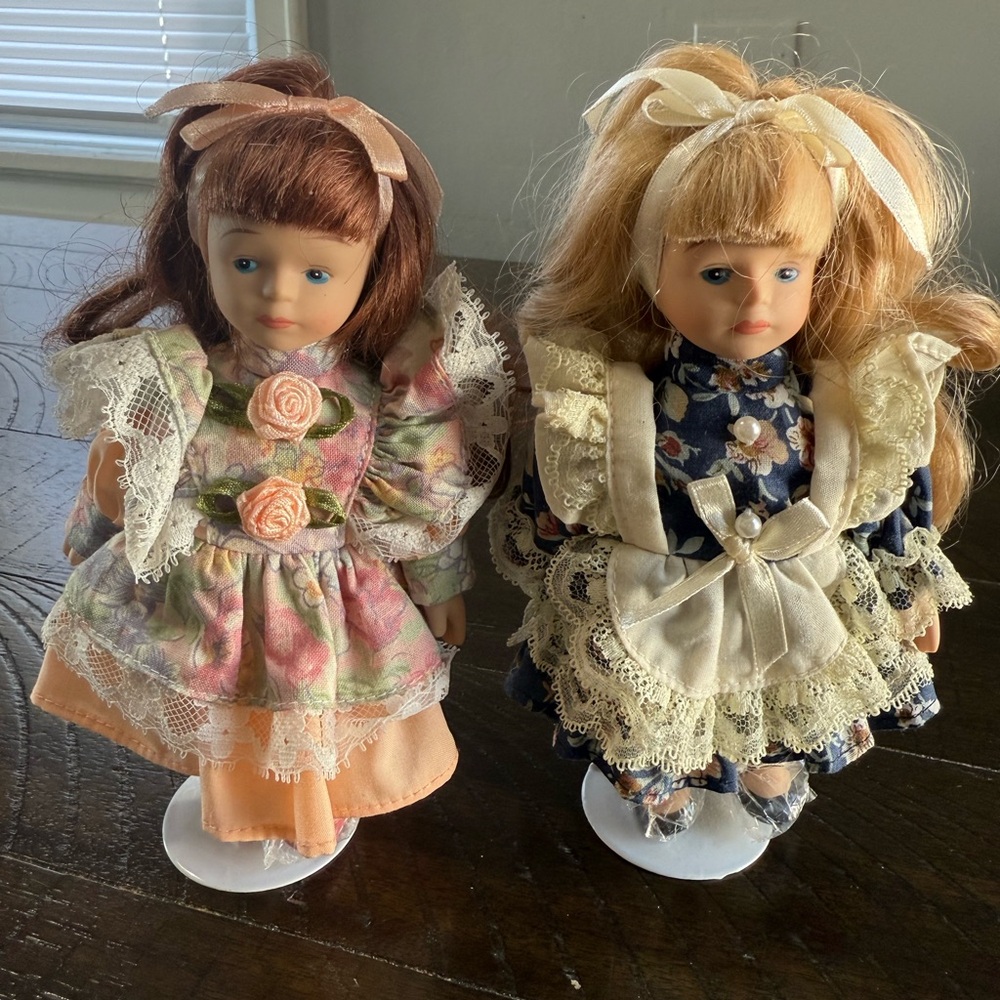 Vintage pair 
of Porcelain Dolls in Floral Dresses